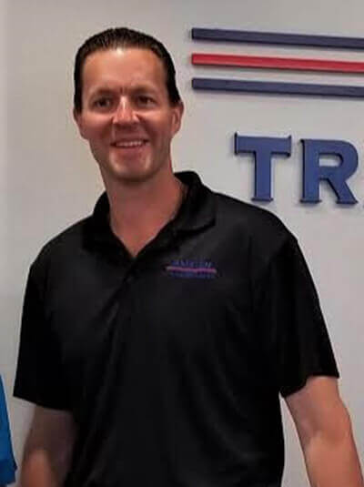 Steven Hribar with Amston Logo